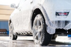 car with soap all over its exterior