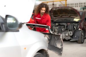 autobody fixing a bumper