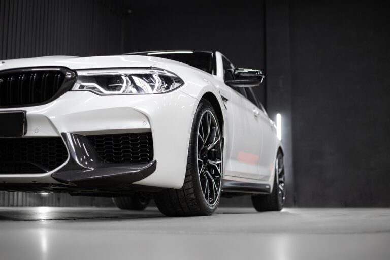 luxury white vehicle with black background