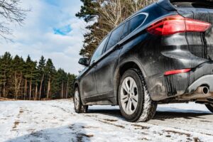 road salt on black suv vehicle