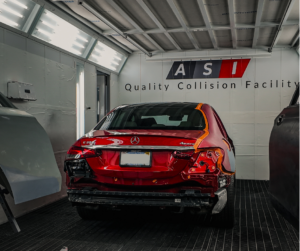 Red Mercedes-Benz in repair shop